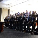 Rosecrest Elementary students sing during board meeting