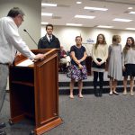 Individual state champions are recognized during board meeting