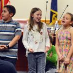 Bridger Elementary student sing during board meeting
