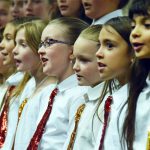 Magna Elementary student sing during board meeting
