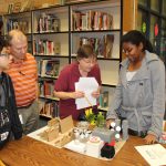Judges assess prototype city created by junior high students