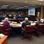 Board members listen to budget hearing