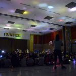 Hunter Elementary students hold up flashlights and glows ticks