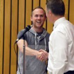Hillside teacher shakes hands with superintendent