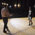 Kearns student walking on stage to be recognized