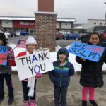 Granite students wave flags in support of Officer Romrell