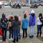 Granite students wave flags in support of Officer Romrell