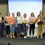 Region 5 PTA awardees stand with plaques