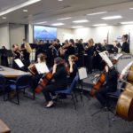 Granite Youth Symphony performs at board meeting