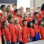 Magna Elementary students sing during board meeting