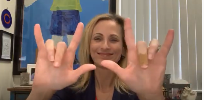 Woman using ASL gestures