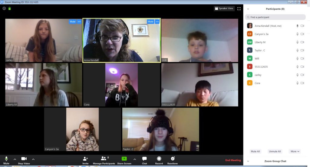 Students and teacher speaking on a video conference call