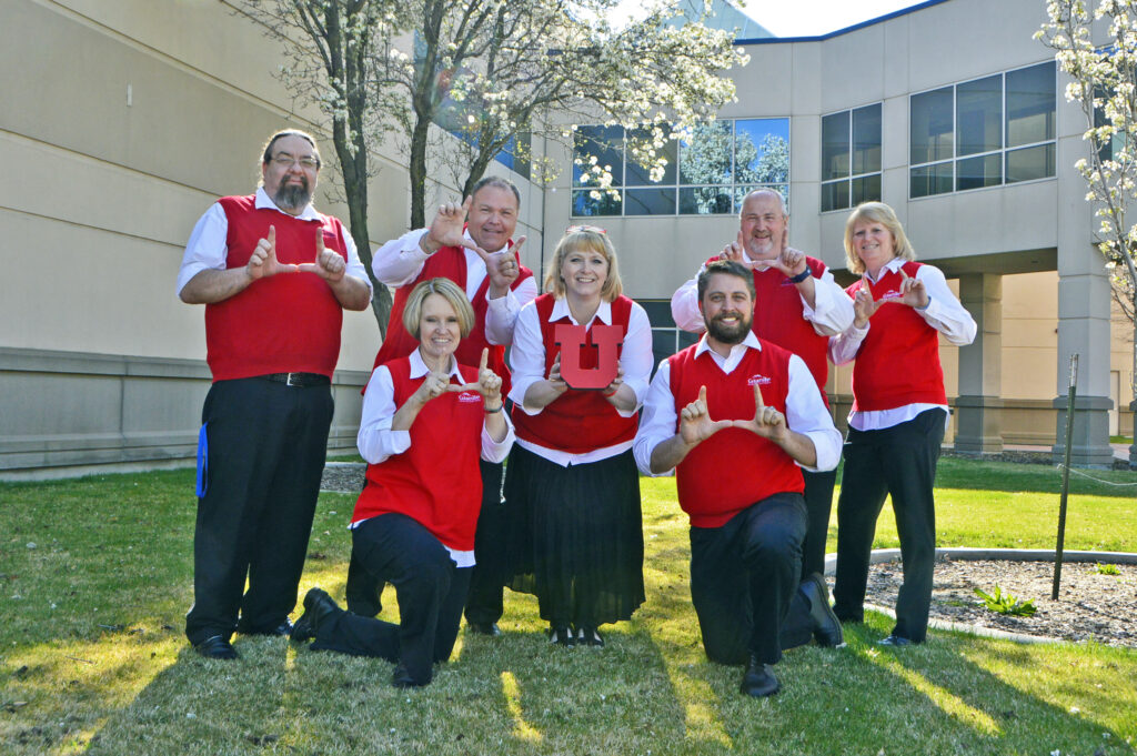 Granite School District HR team giving 'U' salute