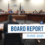 Doug Larson giving presentation to board members. Text: Board Report June 2021