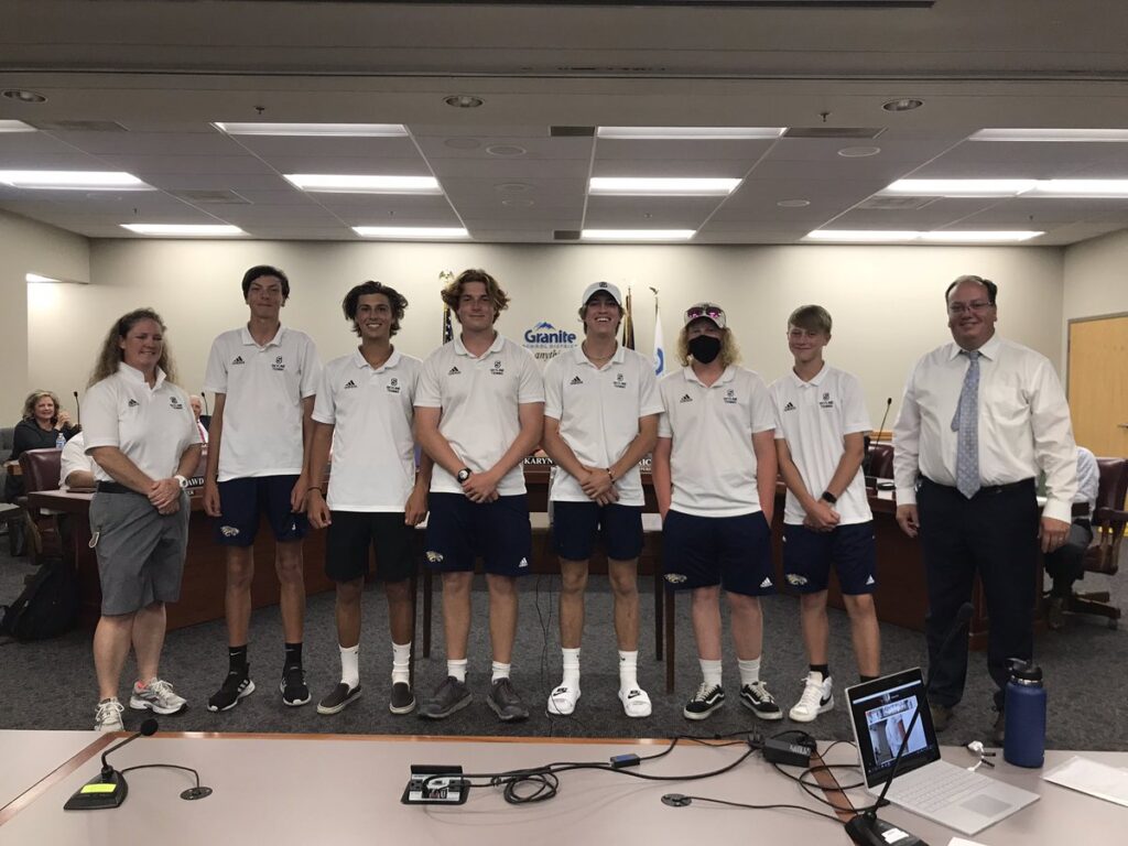 Skyline High boys golf team at board meeting