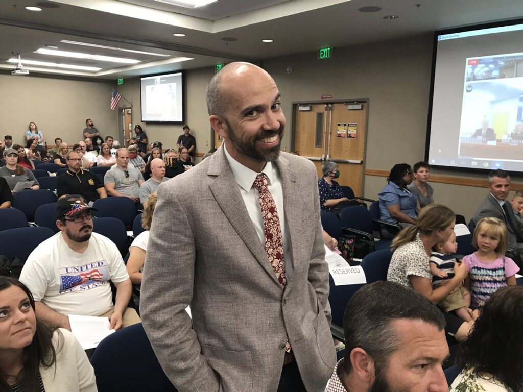 Aaron Bodell at board meeting