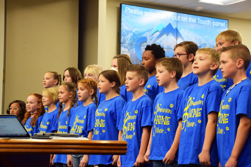 Bennion Elementary students sing at board meeting