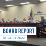 Board members at board meeting. Text: board Report August 2022